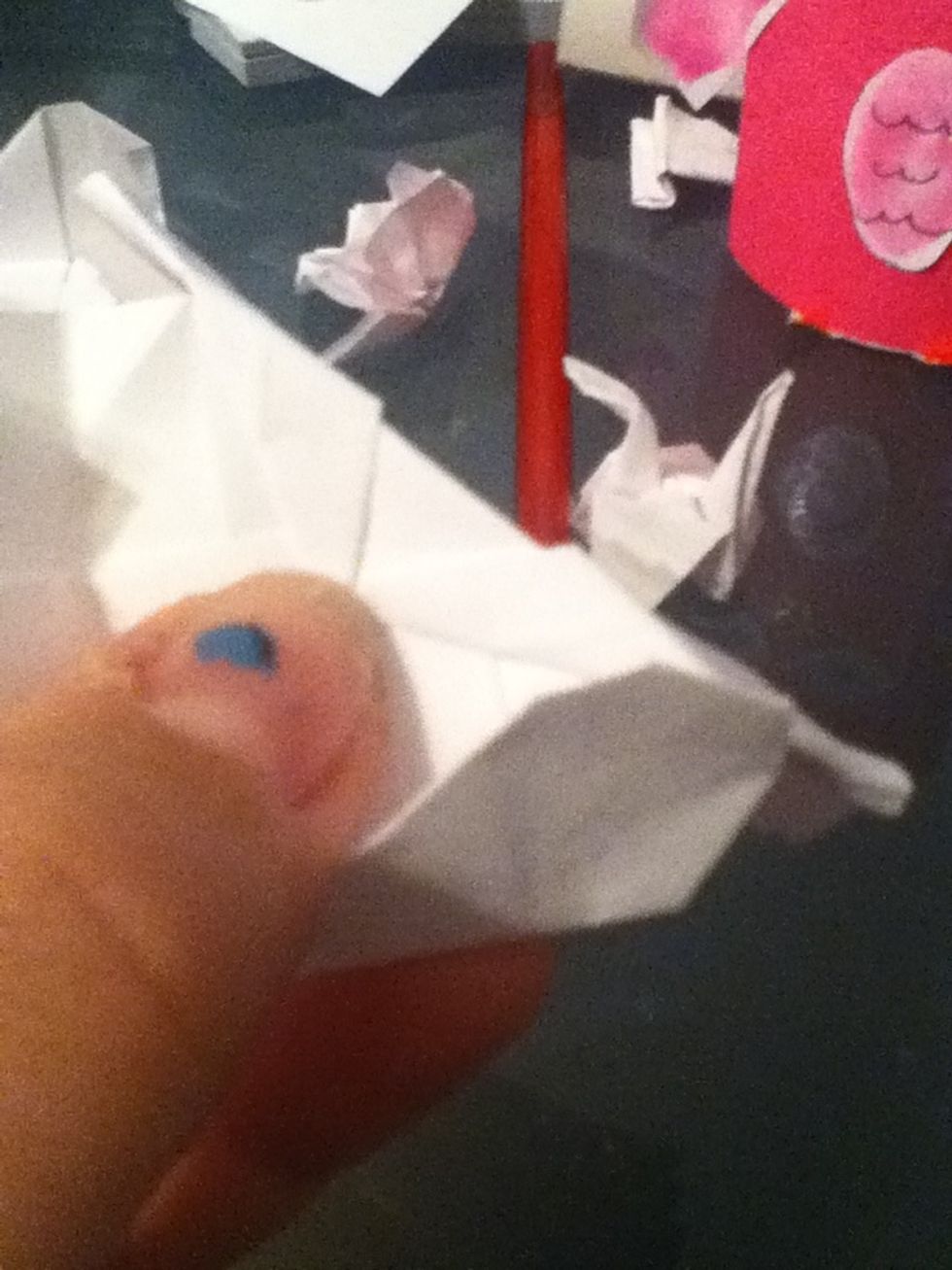 You can just tape it to the inside of the heart (it works without tape)