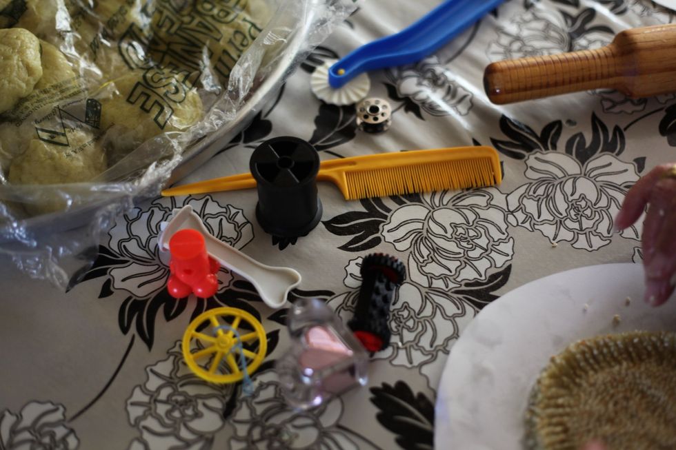 You can Lego, old jewelry glass case, spoon or anything you can imagine to make a nice imprint.