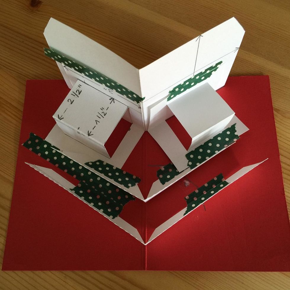 You can make a test by adhering pop-up pieces using washi tape, so you can verify the card can be closed and fits perfectly.