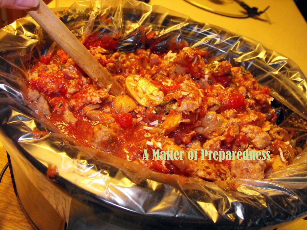 You can make delicious Spaghetti Sauce in your Crockpot from ingredients you probably have in your pantry.  It is a great dinner option for your family on a busy day.