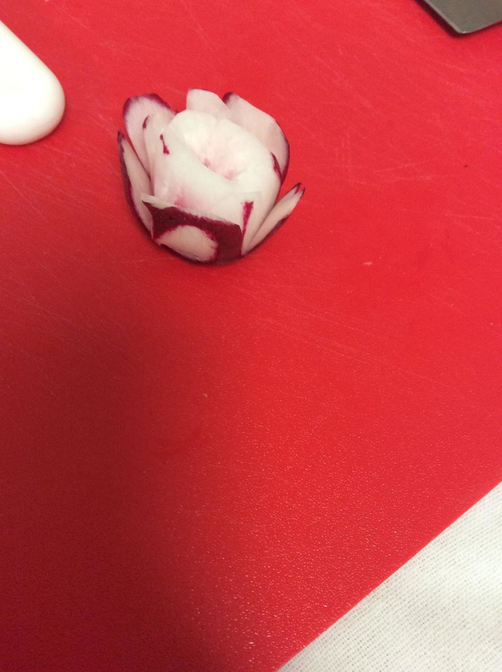 You can make extra petals from the center of the radish making sure not to cut the outside petals.
