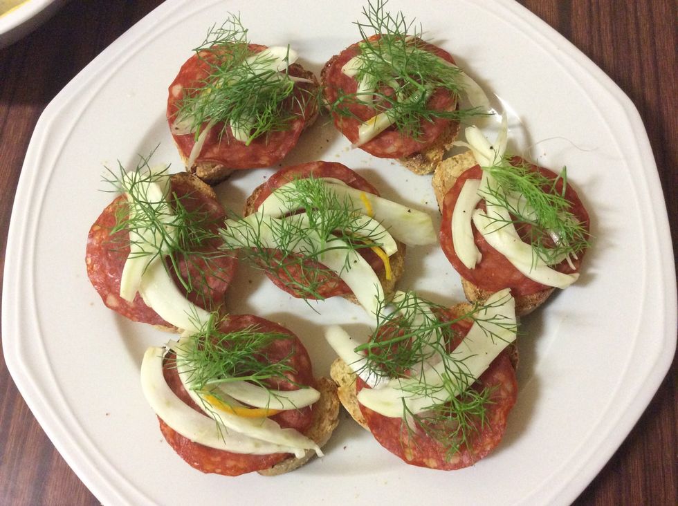 You can make multiple crostini using more bread slices, fennel slices and salami.