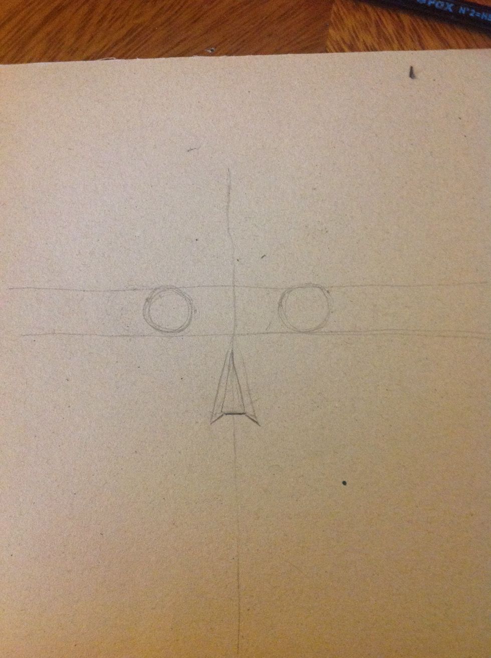 You can manage de high of the nose. Ones you chose where it goings to be draw a triangle based on the vertical line. Then draw to more on the sides as the picture.