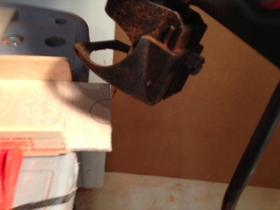 You can mark the thumb hole and then cut with Dremel or scroll saw.