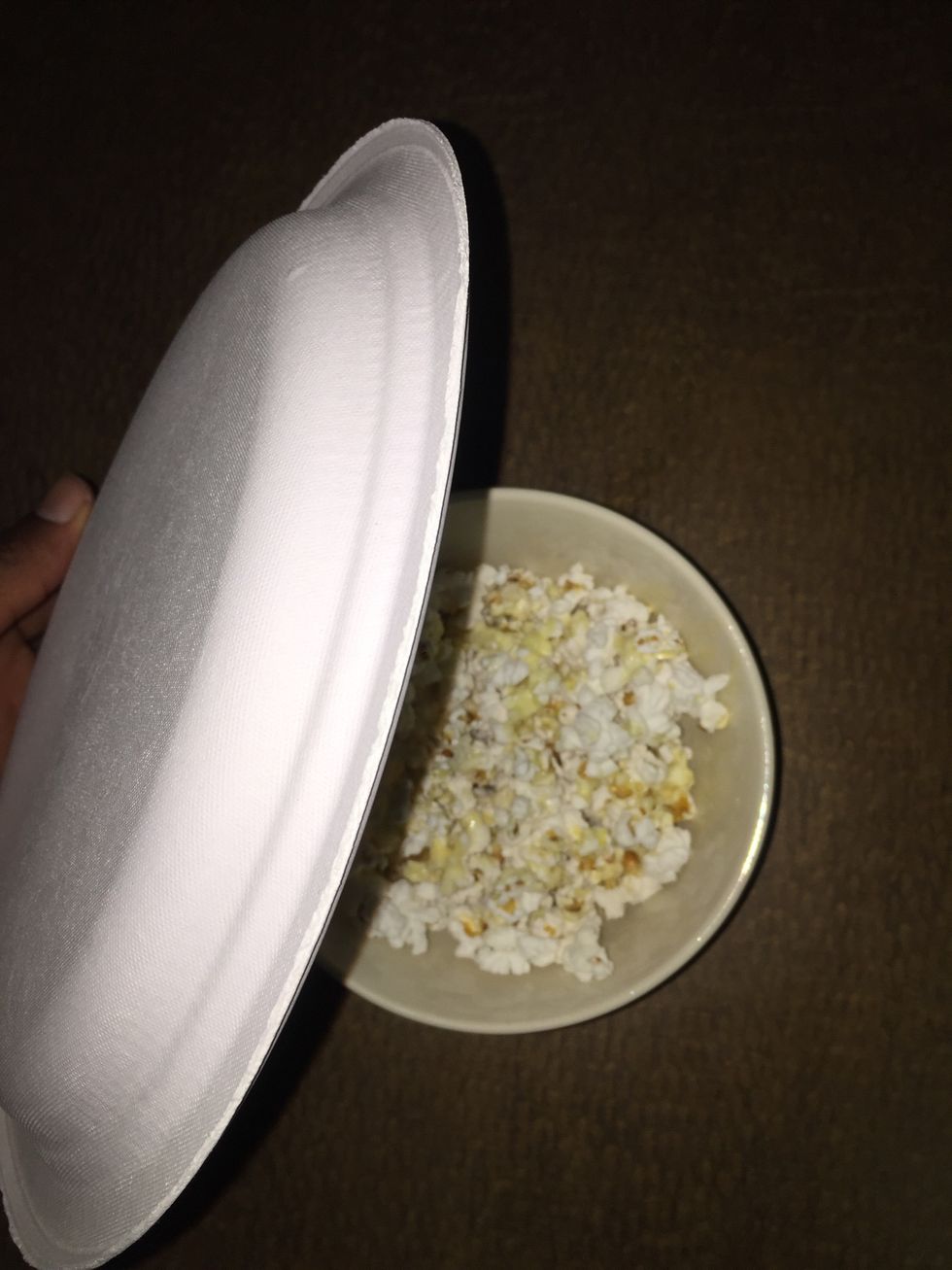 You can mix it by placing a lid or plate over it then shaking it around