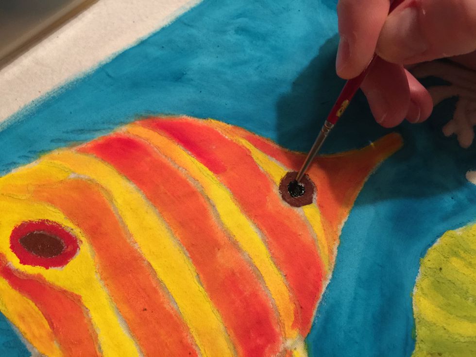 You can paint "in the lines" if you wish, or you can experiment by painting over the lines, remembering that all of the glue lines will be white in the final piece.