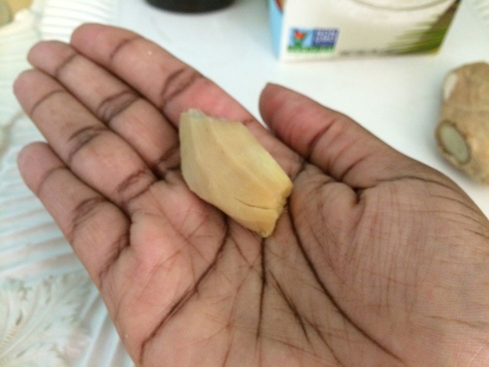 You can peel or unpeel the ginger and add to the blender.