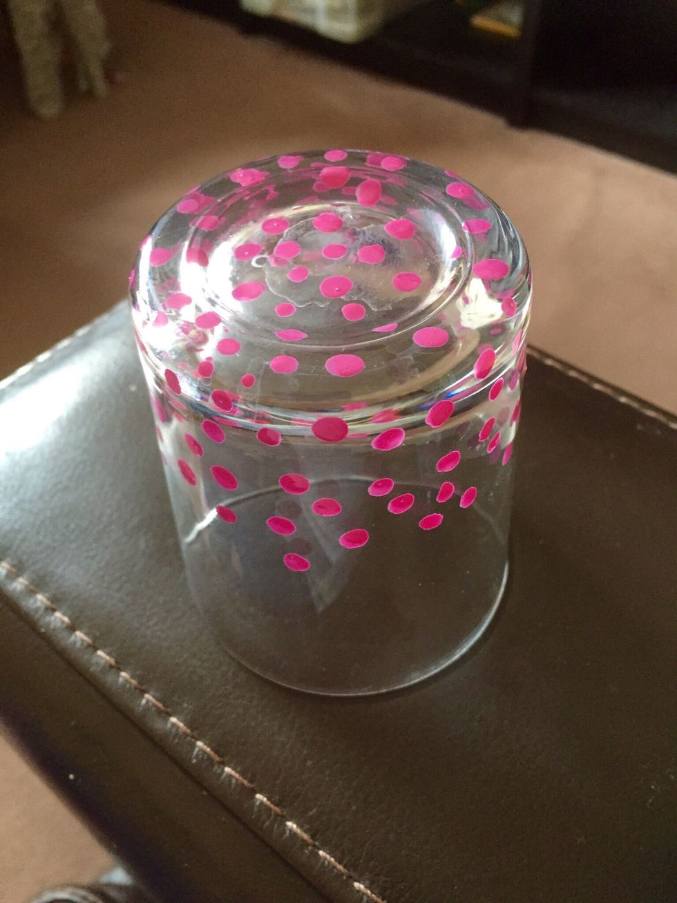 You can put a bit of the nail polish in a plate and dip the cotton buds but I was being really lazy and I just dip them straight into the nail polish bottle. And you start making dots!