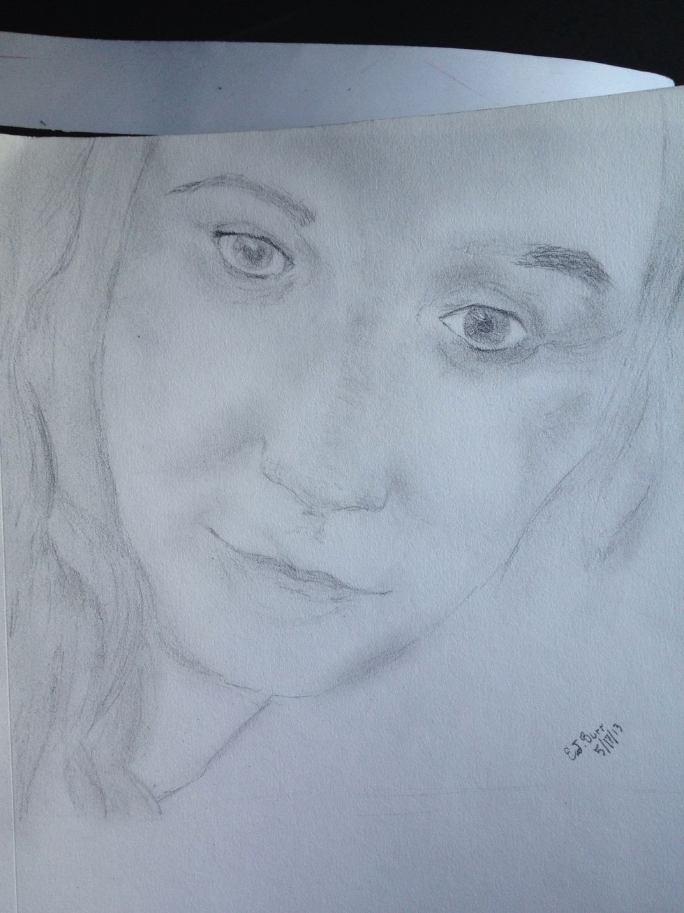 You can really tell on this drawing of mine where it's shaded in. (Sorry about the less than stellar picture.) If you shade too darkly just use your finger to blend it a bit more.