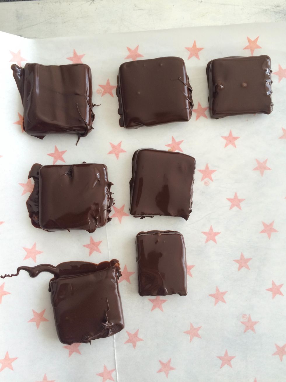 You can rest them until they harden or if you get desperate like me put them in the fridge for half an hour.