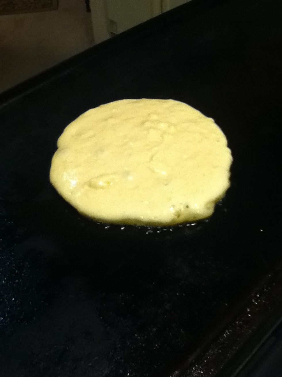 You can scoop your batter out with a half cup. Be sure to check your pancake side about every 20 seconds depending on the heat.