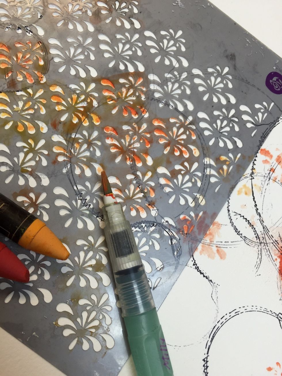 You can scribble over your stencils with your crayons and use your brush to dilute