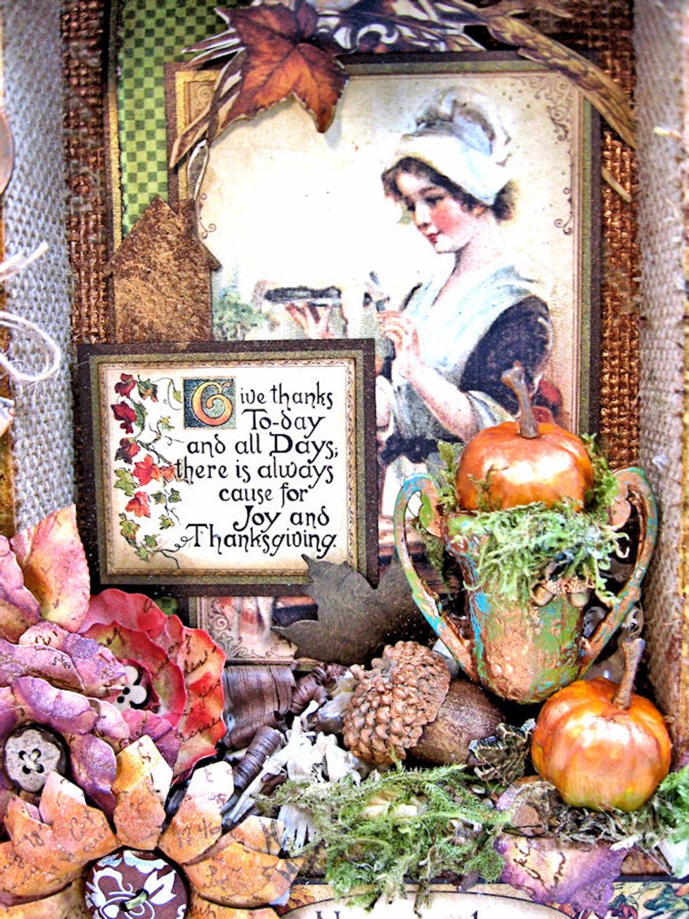 You can see here how I matted the images, added fussy cut leaves and clustered elements to form a vignette.