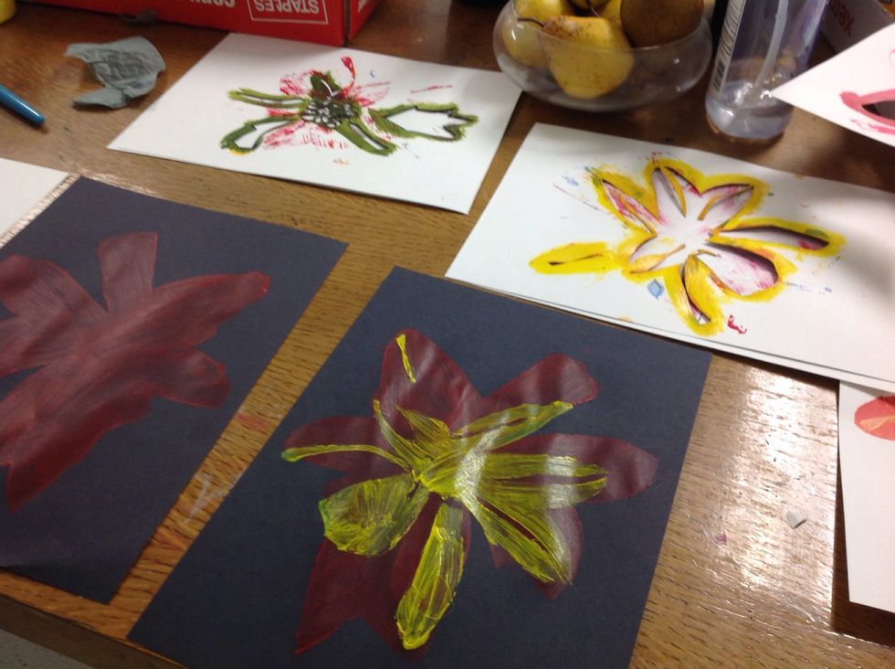 You can see here that I keep the stencils on separate pieces of paper, but handy as I print quickly and usually four prints at a time.