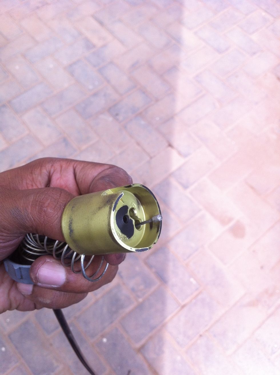 You can see how the cable is ready to be pulled out of the piston.