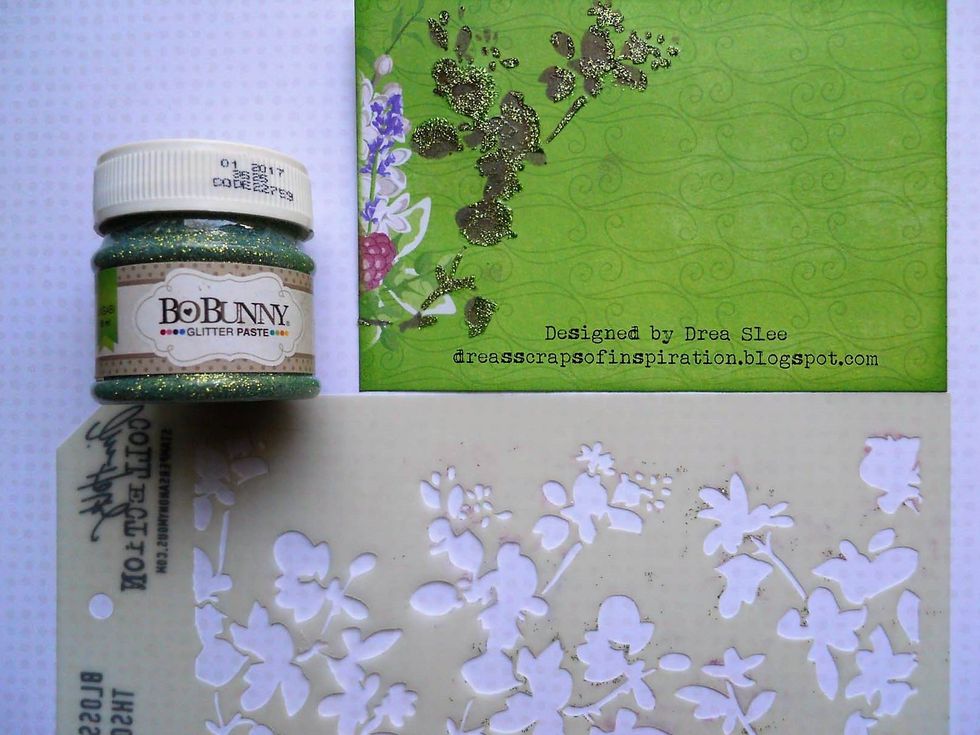 You can see in this photo the part of the stencil that I used right below. Place your stencil over the ink again, and lightly apply some Glitter Paste (Wasabi).