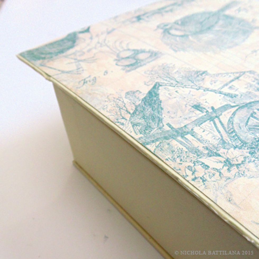 You can see my paper is slightly smaller than the actual box, leaving a 1/8th" edge.