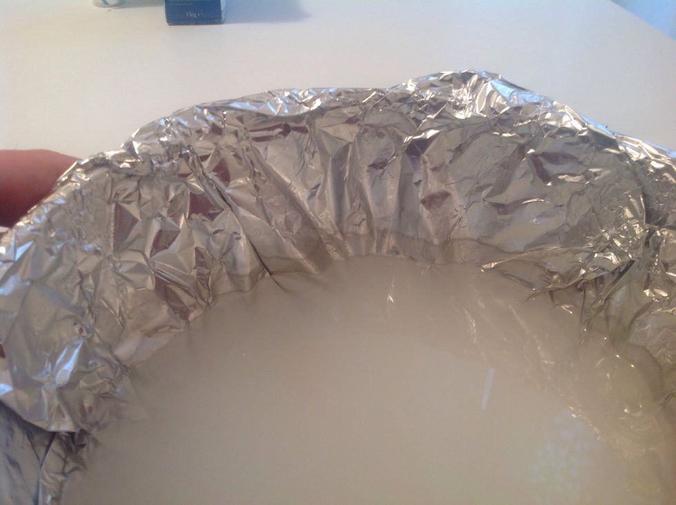 You can see that aluminium foil become brown while the silver object return shining... A redox reaction is happening...