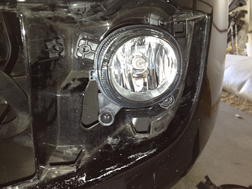 You can see where the tough clip holes are. They are the square-ish holes on right top, and bottom. You can kind of see how the clips fit in and how to pull the right way without breaking anything.