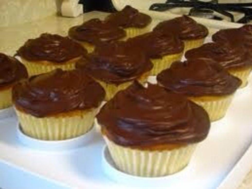 You can simply bake your chocolate cupcakes and add your chocolate frosting or you could buy some from your store . Sorry if the picture isn't perfect ;)