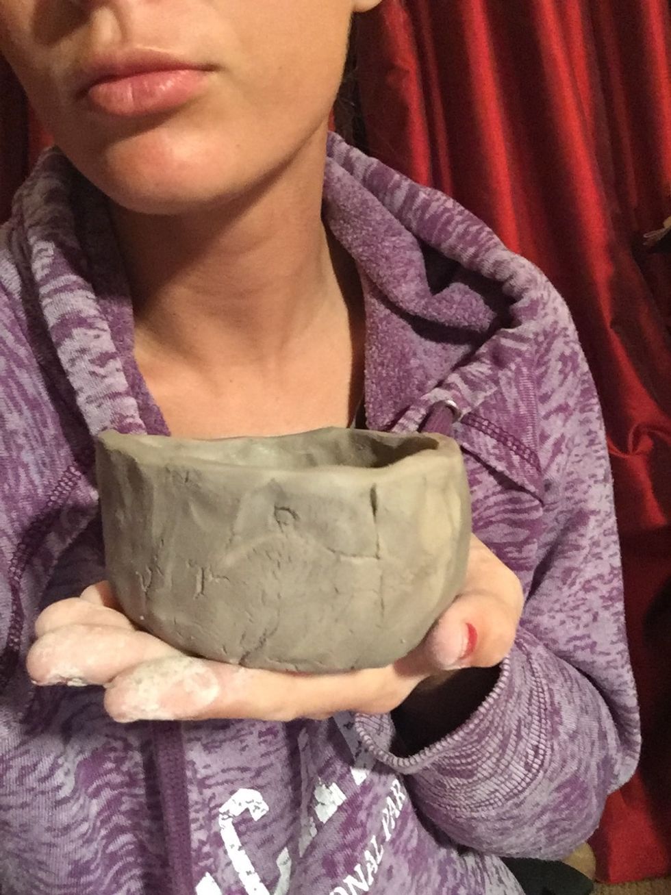 You can smooth the outside if you want but I personally like the texture it gives the pot