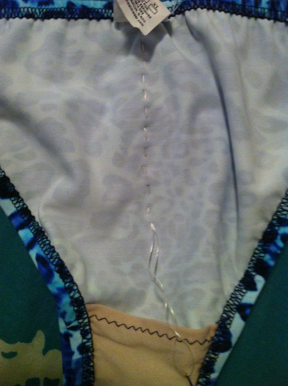 You can stitch as low as you want. Little scrunch = not too low, mega scrunch= almost all the way to the lining. I like mine mega scrunched.