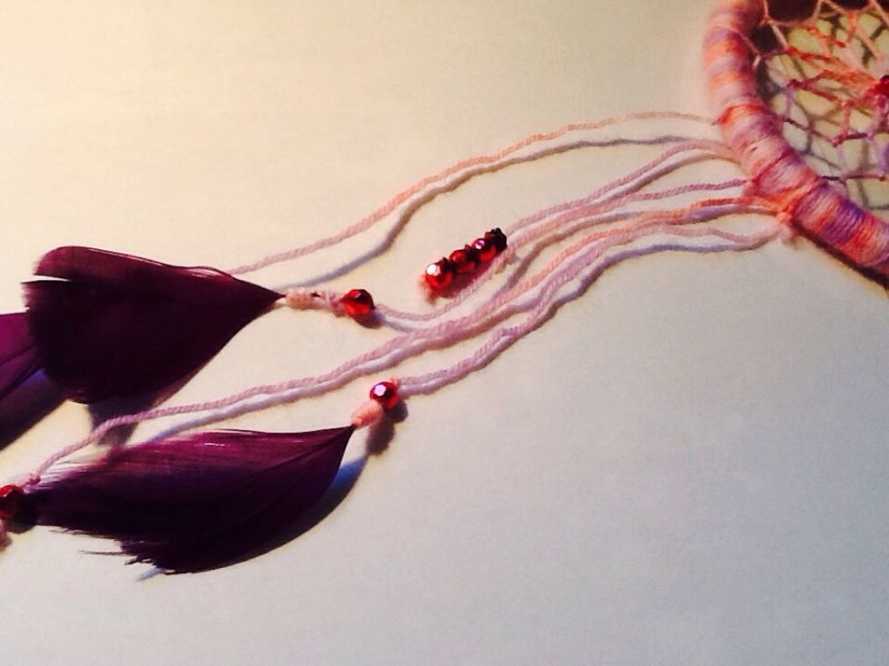 You can stop here, or you can add more items to hang down. I chose to add different textured yarn.