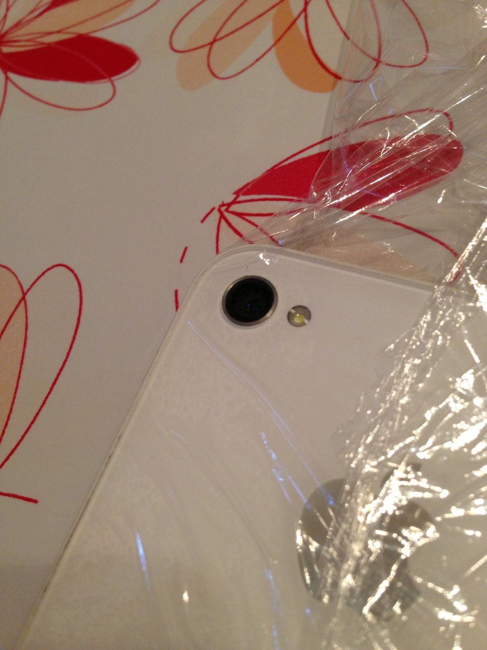 You can stretch the plastic wrap at the camera lense to keep the function. Later in this guide i show you a picture, made with the plastic wrap.