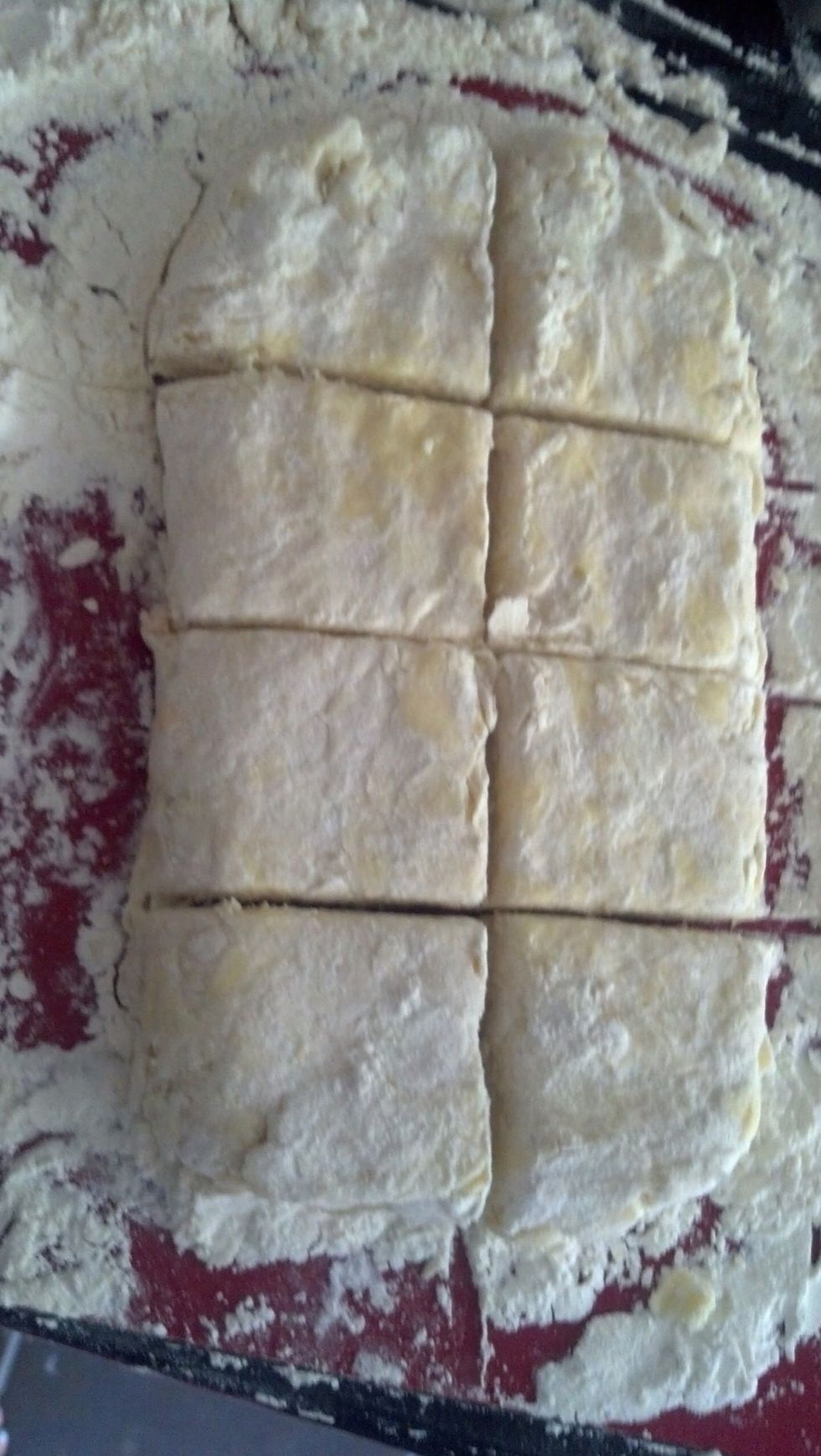 You can use a biscuit cutter, or a glass dipped in flour to make circles, but I just cut into squares so I don't have to re roll the extra bits.