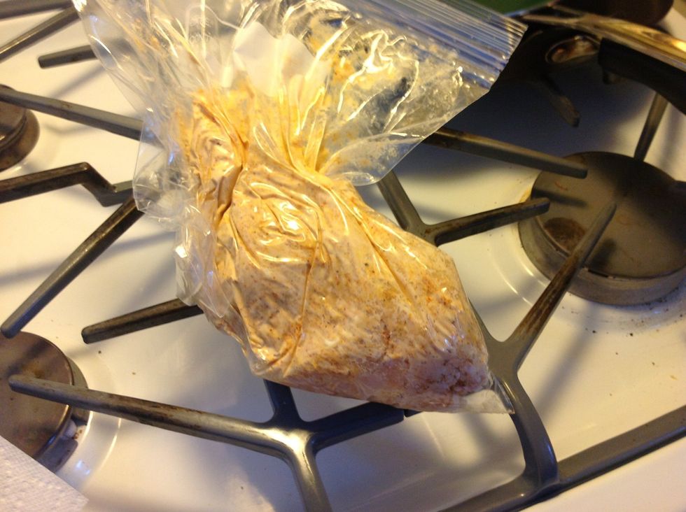You can use a fancy pastry bag for the next step, but gallon plastic bags work just as well and require no clean-up. Just cut off a corner of the bag when ready to fill peppers.