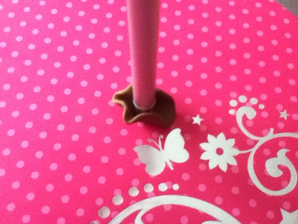 You can use a marker or a pencil you just need something the desired width. Whatever you  decide to use put it in the middle of the clay  & start folding the sides.