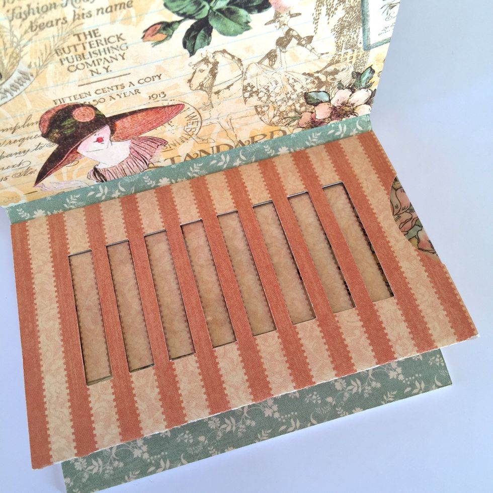 You can use a photo to make this technique. Stick the page on the spine.