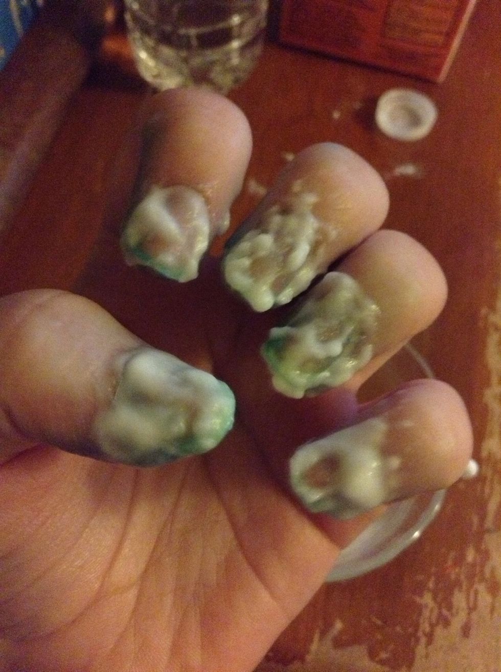 You can use a q-tip to dab it on your nails. Let it sit for about ten minutes, and then just wash your hands.