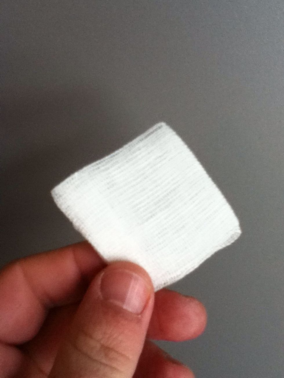 You can use any kind of tissue to get this job done, but I prefer first-aid gauze. Its structure         grabs the leftover glue perfectly.