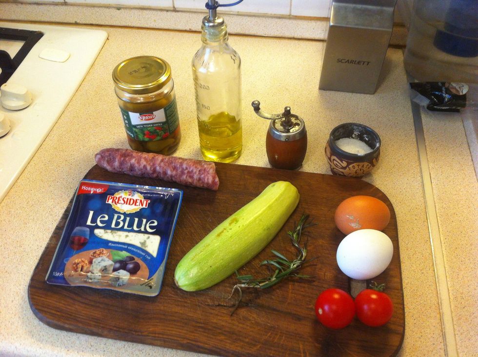 You can use any other oil, sausage and cheese what you like. I use olive oil, uncooked jerked sausages, salty blue cheese and bulgarian chillies.