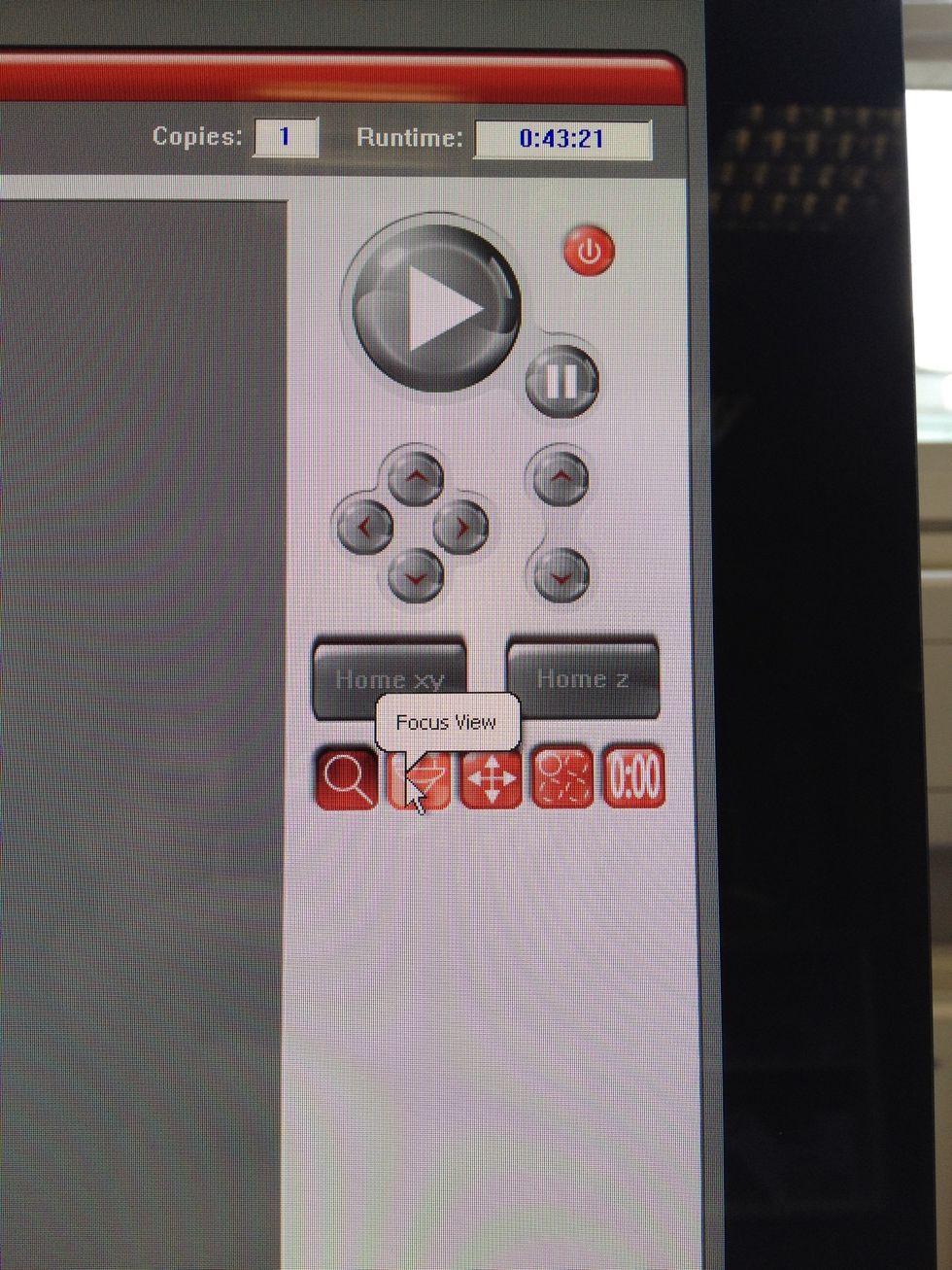 You can use focus view to move the laser to points on the image. When the lid is open, a visible light will be on. Do not obstruct any of the moving mechanisms.