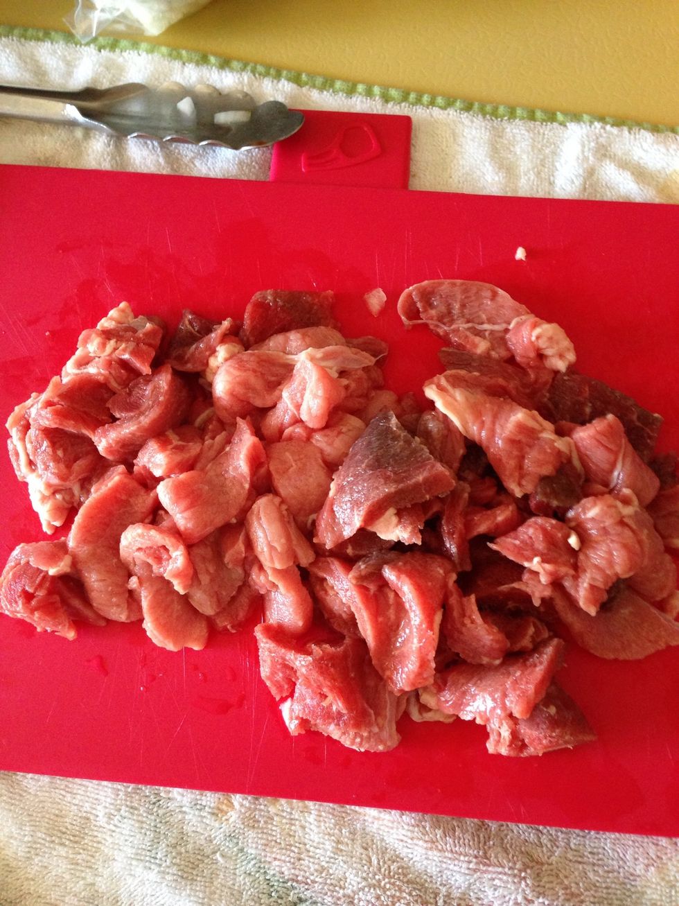 You can use pork or milanesa. I used milanesa. Cut meat into bite size pieces. Add salt and pepper to it before adding to the veggies.