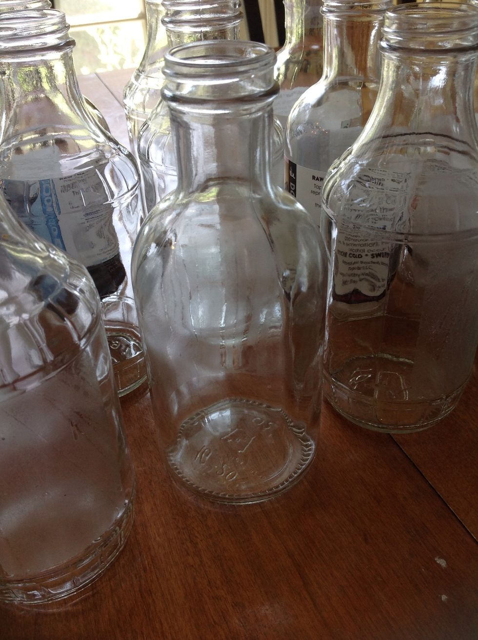 You can use recycled glass bottles for you kombucha as long as the lid isn't metal. The metal interacts with kombucha and can change the taste.