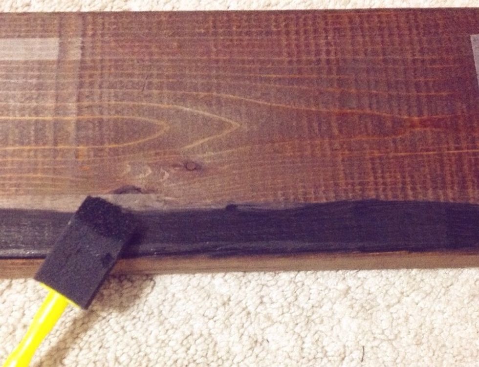 You can use special wood paint or acrylic paint if you already have that at home. I'm using a foam brush to paint 3 layers of black around the edges.