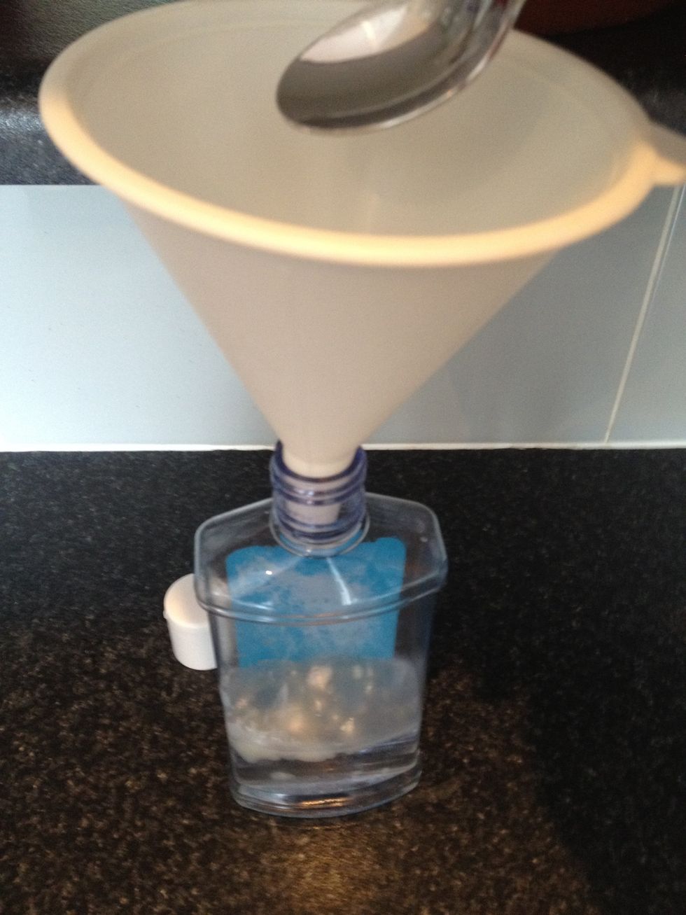 You can use Xanthan gum or Guar gum, both do the same job which is to thicken the liquid. Use a funnel to add your ingredients to the bottle. Half a teaspoon of gum is enough.