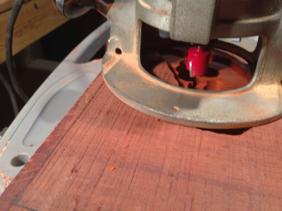 You can use your router to knock out some of the wood that you couldn't drill