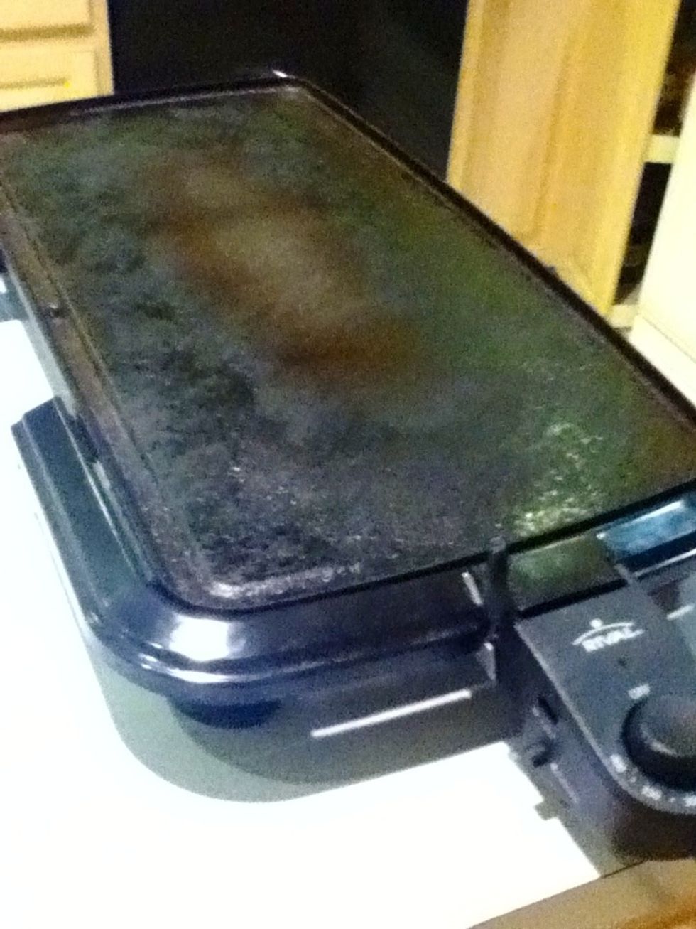 You can use your stove or a griddle. I will be using a griddle because it is much easier. Be sure to spray your griddle or stove with oil before pouring batter on.