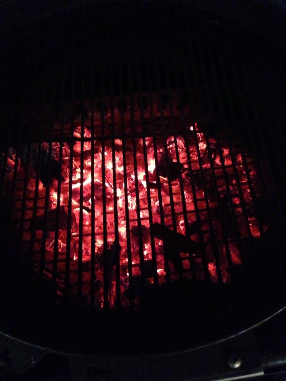 You do NOT want a HOT fire - the doughy crust will char easier than a pre-made crust. TIP: use pre-made crust to save time/hassle. I like the boboli thin crust if I go that route.