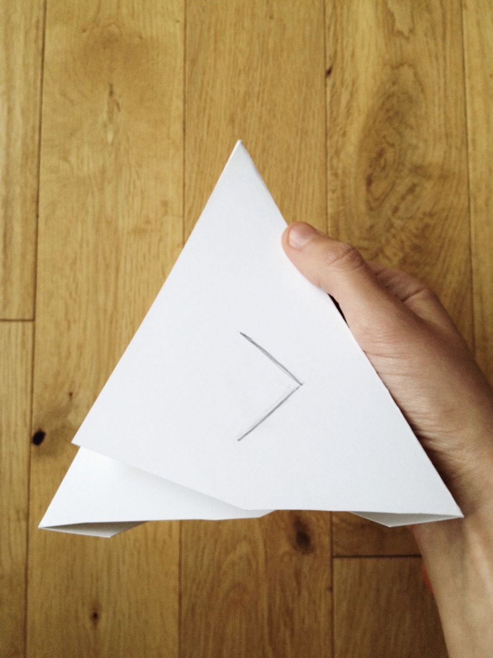You don't have a stapler or glue or tape? In that case, turn it belly up and cut this tab. (Careful, don't cut yourself while trying to stab through the paper!) \u2702