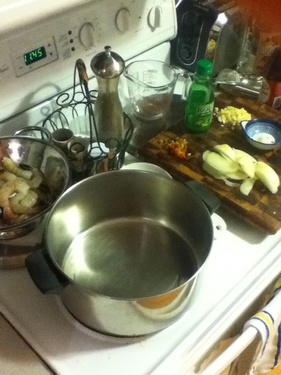 You don't need a good pan (these are gonna be fast) but it should be big enough that the shrimp aren't piled on top of each other, so if you've got a thin, cheap chili pot like mine, that's perfect.