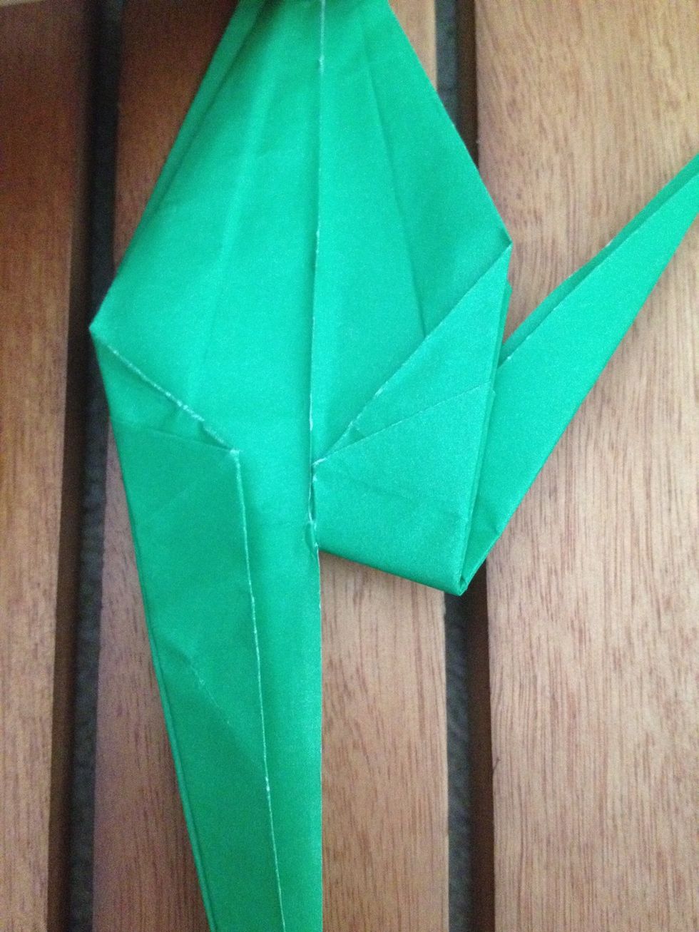 You don't want it to fold straight up, follow the angle of lines above where you will make the crease.