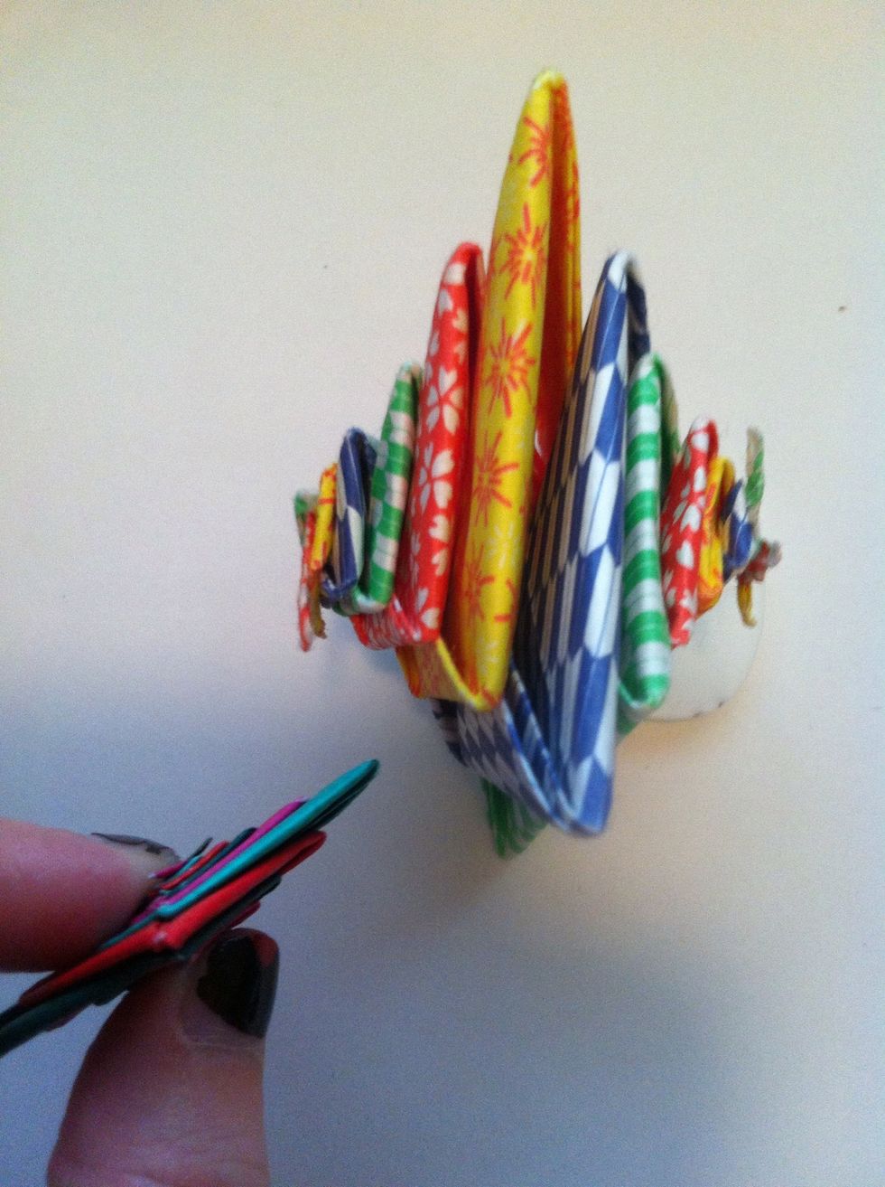 You get this! Just pull on the points gently to make it more three dimensional. You can squish it over n over if you're bored.