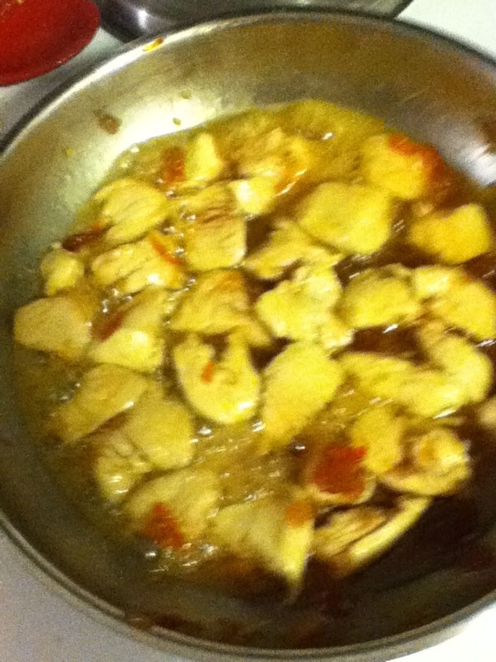 You gotta pay attention at this point! Stir fry your chicken while that sauce cooks down. The trick is to get the chicken done at the same time the sauce has thickened into a glaze. You'll get it.