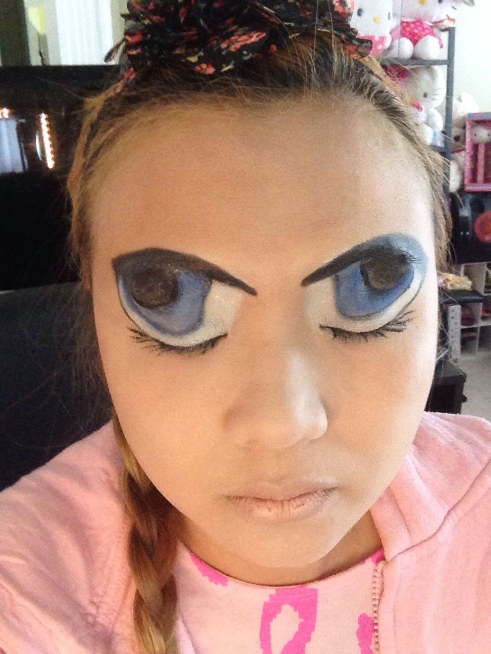 You have to cover your entire eyes with white pencil from NYX then use your black pencil to free hand the eyes. Use your eyes as a guide where to draw. Your brows should be black.