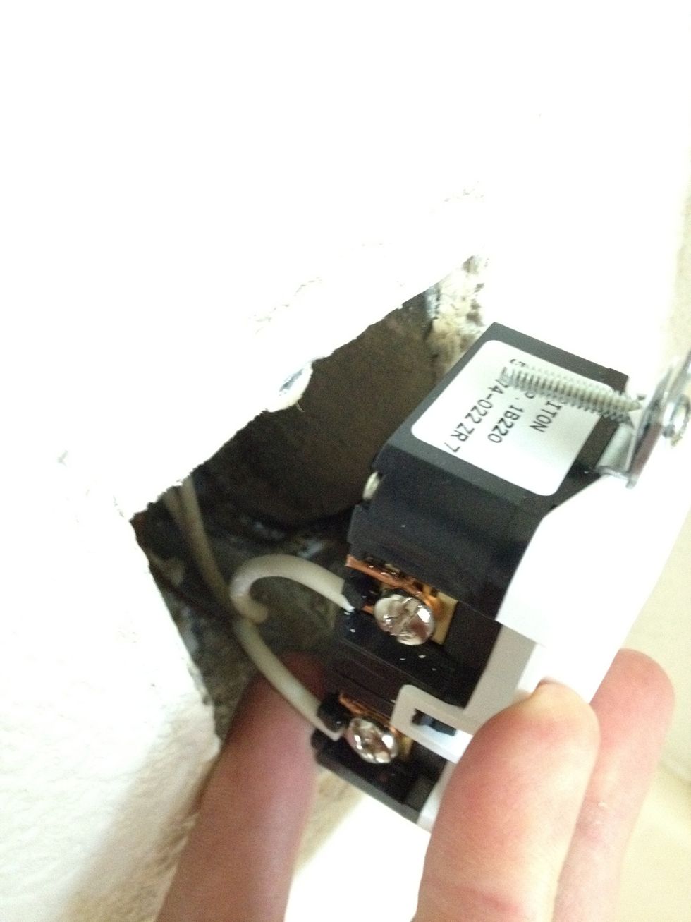 You kinda have to stuff the wires back in the J-box to get the outlet to fit back in there correctly. You shouldn't be able to mess anything up so just squish it all in there until it fits.